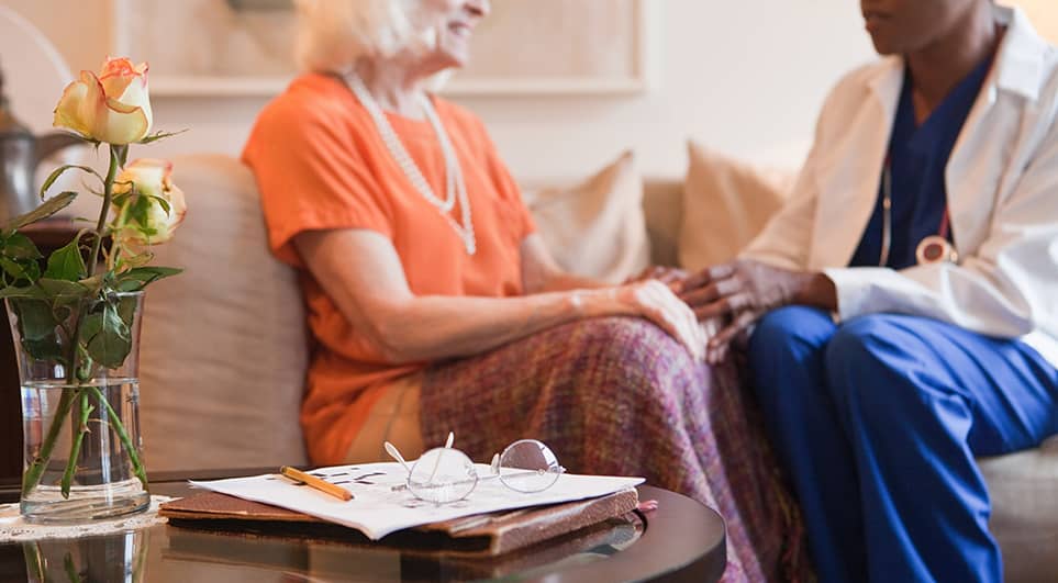 lady speaking to doctor