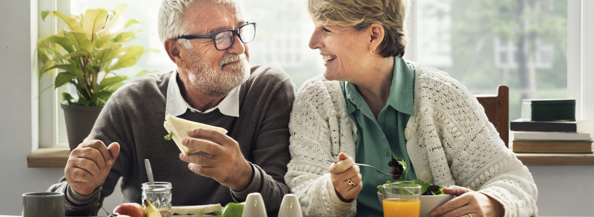 Older couple eating healthy lunch together