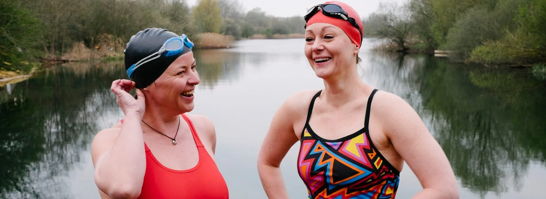 Happy women swimming